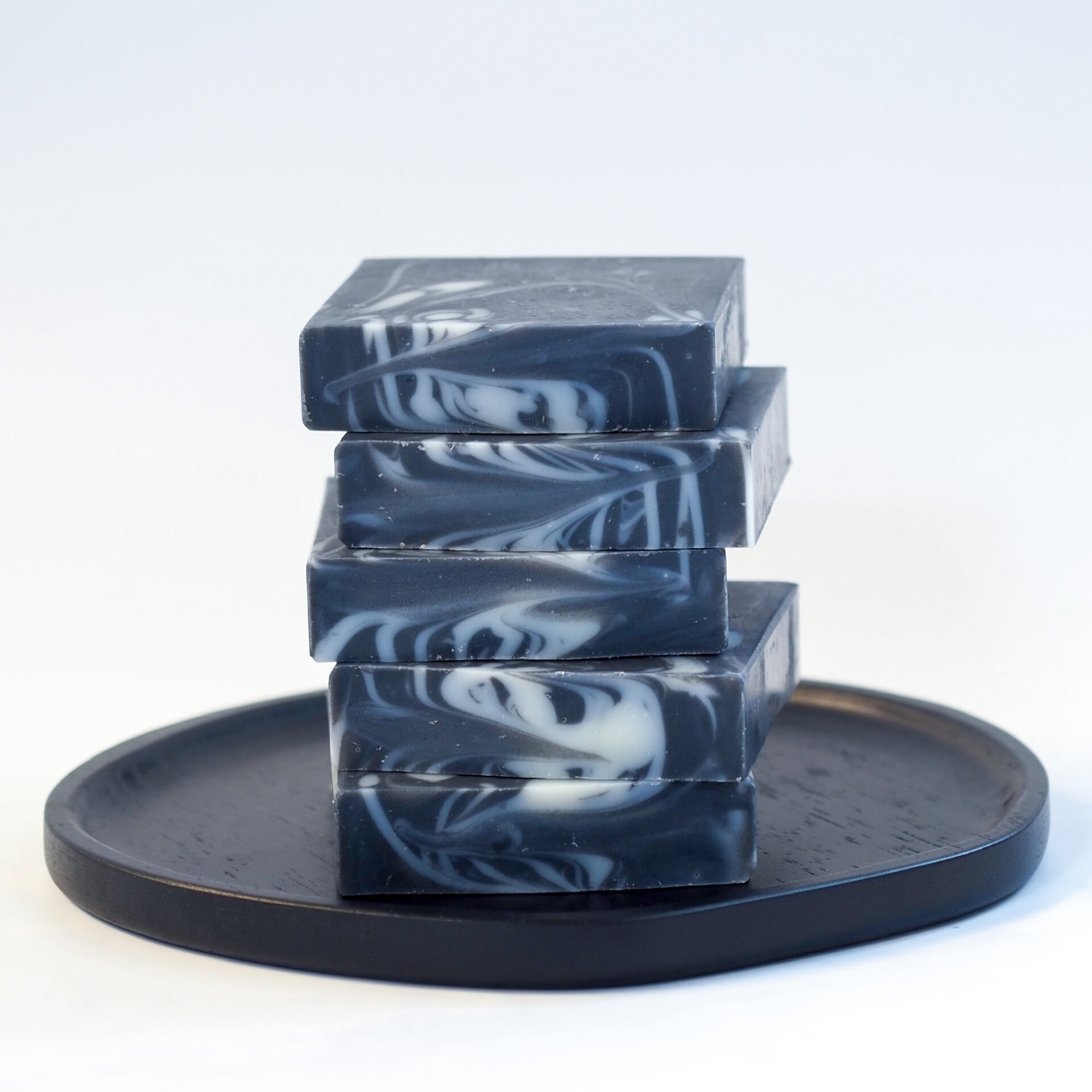 Nienie soaps small-batch charcoal facial bar soap on a white background