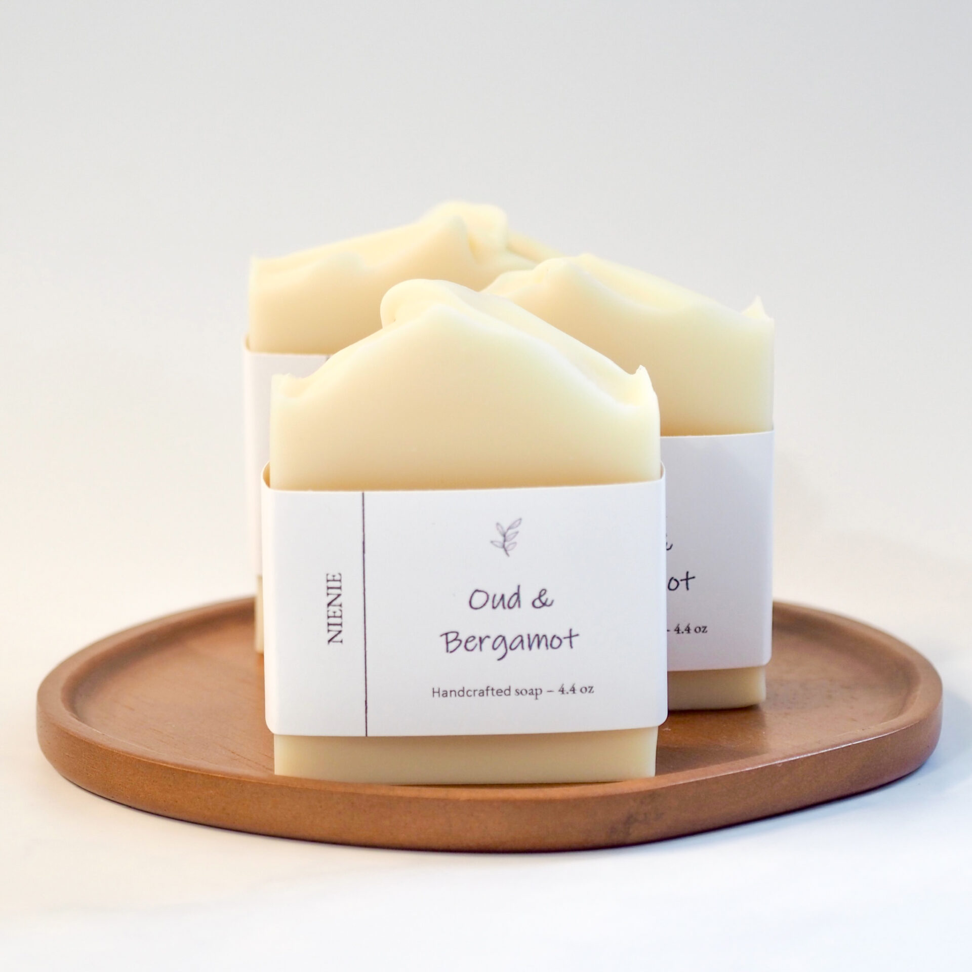 Nienie soaps small-batch oud bergamot bar soap on a white background